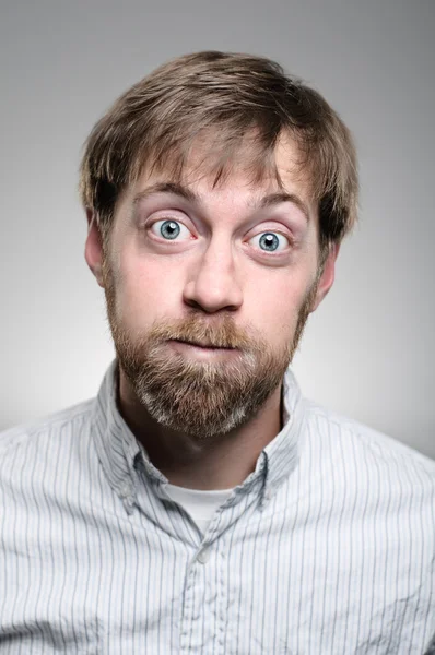 Caucasian Man Blowing His Cheeks — Stock Photo, Image