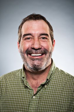 Mature Caucasian Man Smiling Portrait clipart