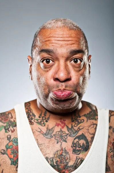 Stylish African American Man With Many Tattoos Pouting — Stock Photo, Image