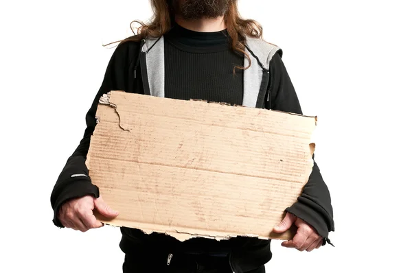 Bezdomovec držící lepenky znamení — Stock fotografie