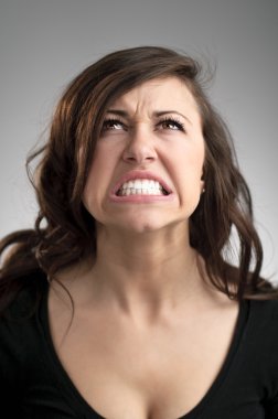 Angry Young Caucasian Woman Portrait clipart