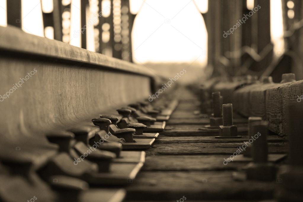 railway sleepers and rails, b & w