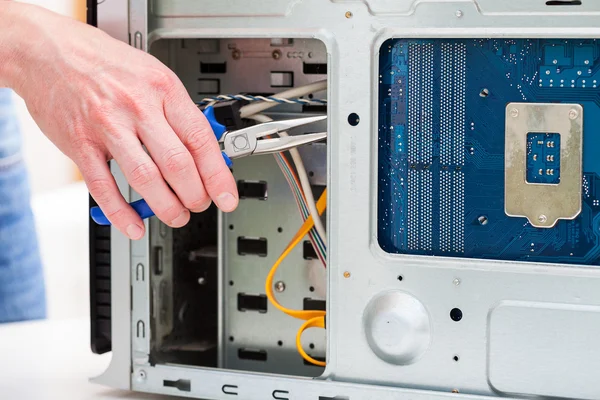 Fixing the computer — Stock Photo, Image