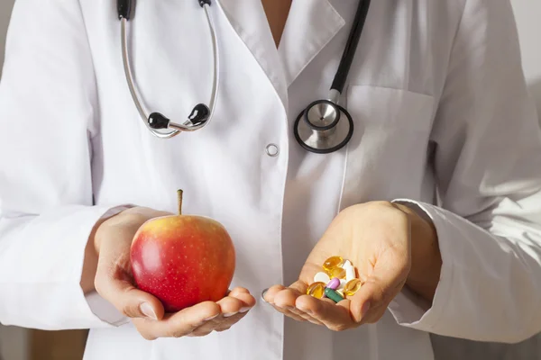 Doctor with vitamins — Stock Photo, Image