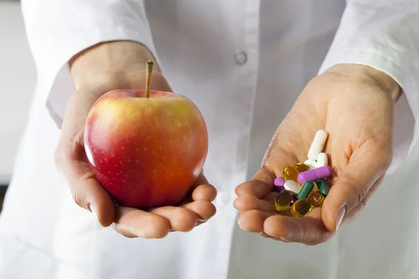 Apple and drugs — Stock Photo, Image