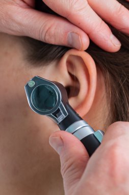 Ear examining clipart