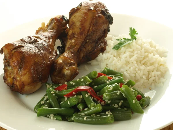 Chicken legs with rice — Stock Photo, Image