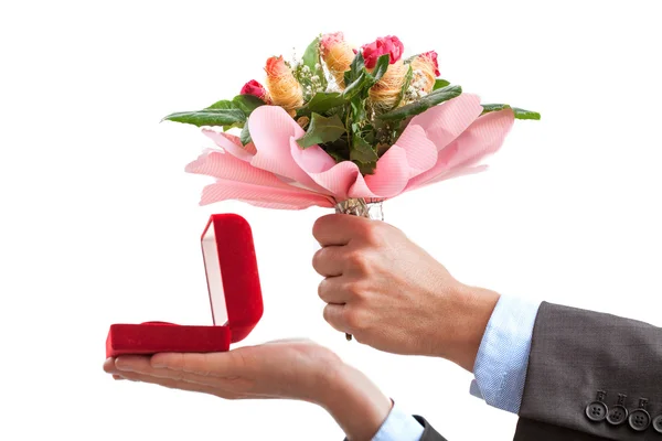 Marriage proposal with ring and flowers — Stock Photo, Image