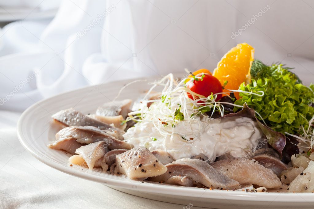 Dish with herring and cream