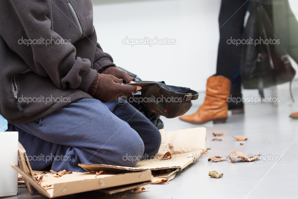 Male homeless begging