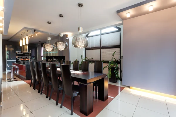 Huge table in a modern dining room — Stock Photo, Image