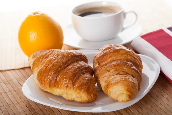 Coffee break with croissant — Stock Photo, Image