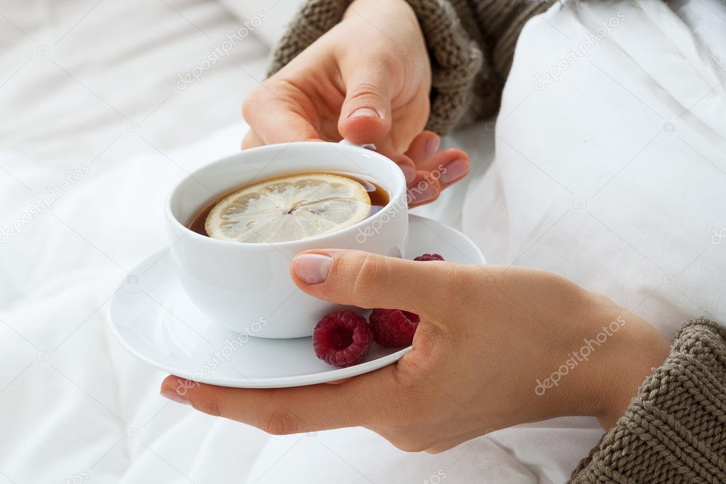 Hot tea with raspberries for flu