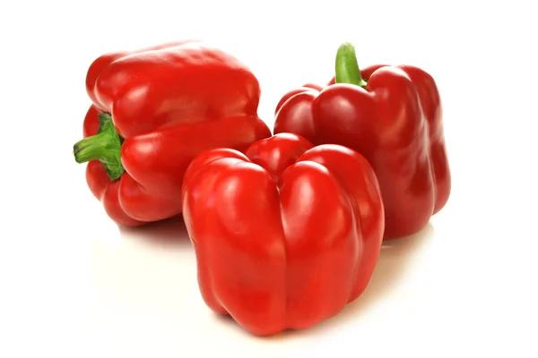 Three red bell peppers — Stock Photo, Image