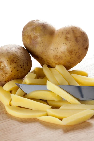 Potato heart and chips — Stock Photo, Image