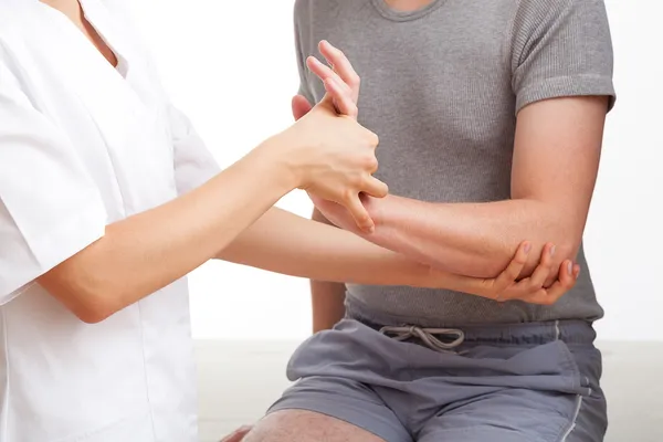 Hand and wrist examination — Stock Photo, Image