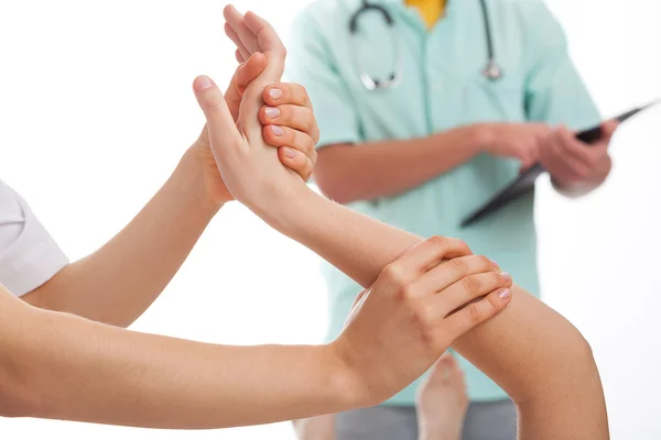 Examination of injured wrist — Stock Photo, Image