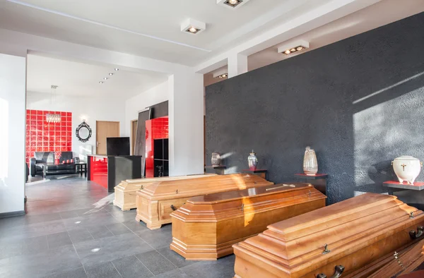 Funeral office with coffins — Stock Photo, Image