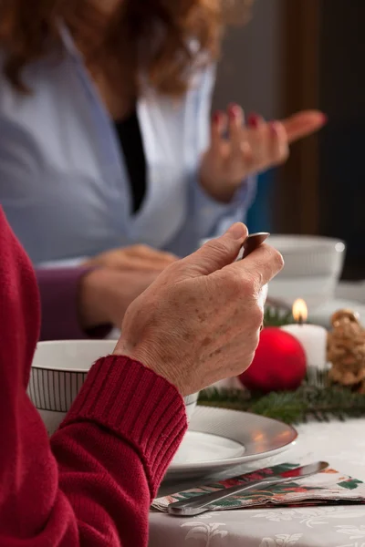 Conversation during christmas dinner — Stock Photo, Image