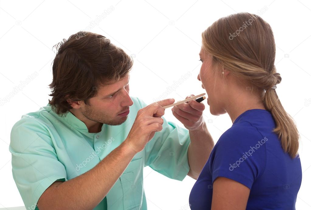 Laryngologist examining his patient