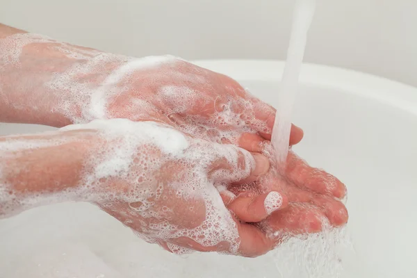 Hands rinsing — Stock Photo, Image