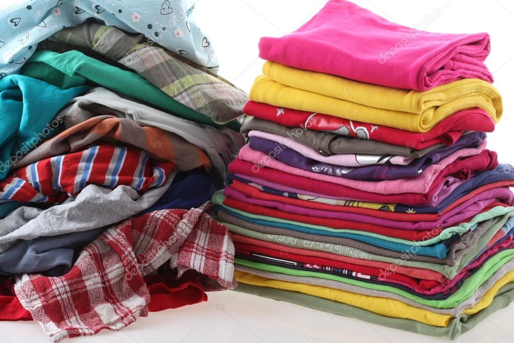 Pile of messy and ironed clothes — Stock Photo © photographee.eu #36853943
