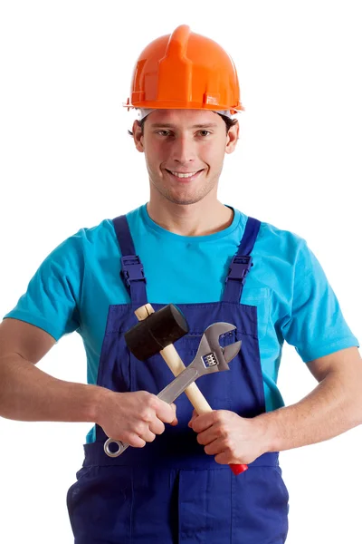 Mechanic with crossed tools — Stock Photo, Image