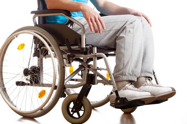 Zittend in een rolstoel — Stockfoto