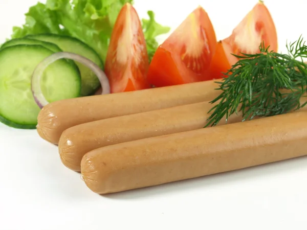 Tasty sausages for breakfast with garnish — Stock Photo, Image