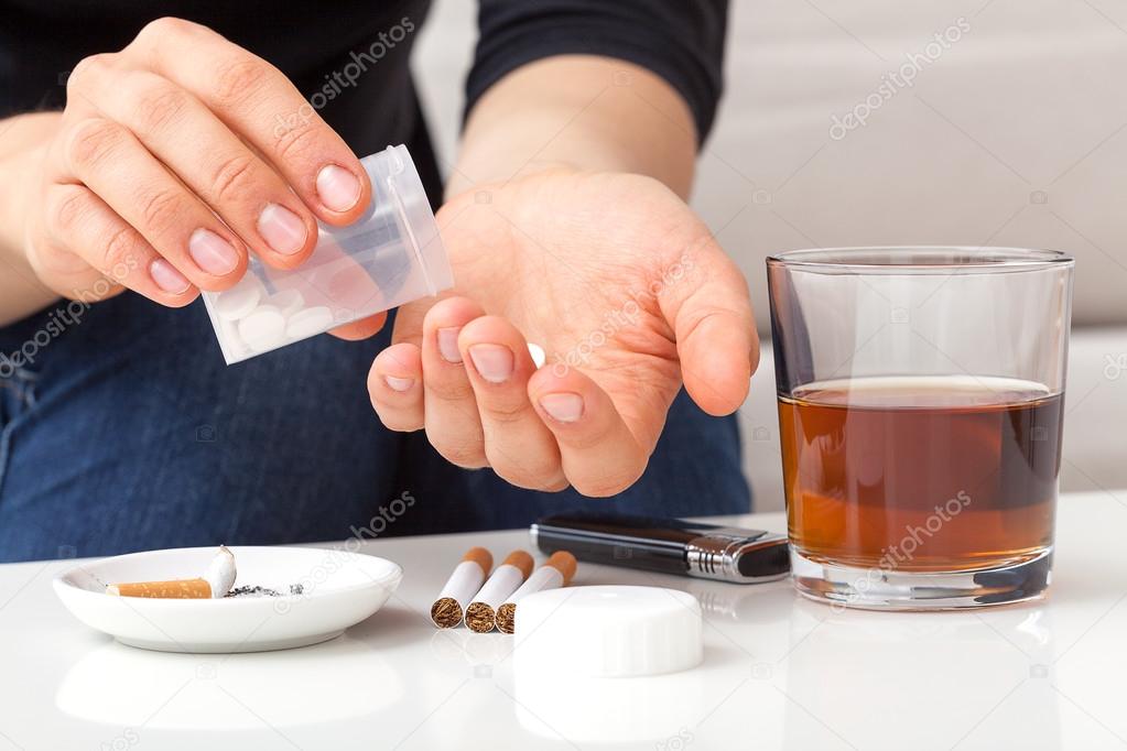 Addict taking pills