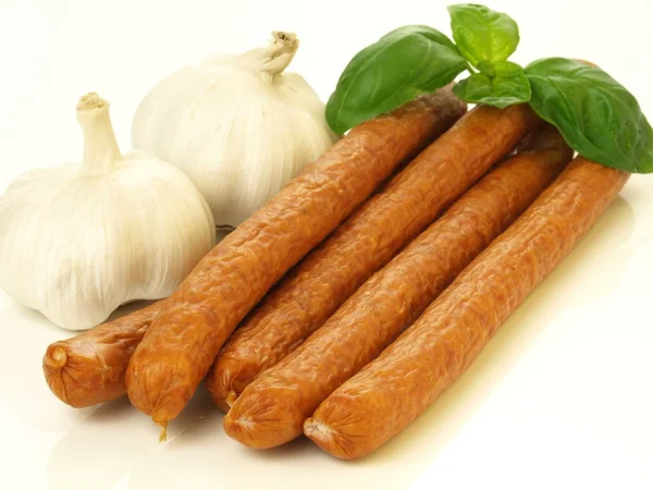 Sausages with garlic and herbs — Stock Photo, Image