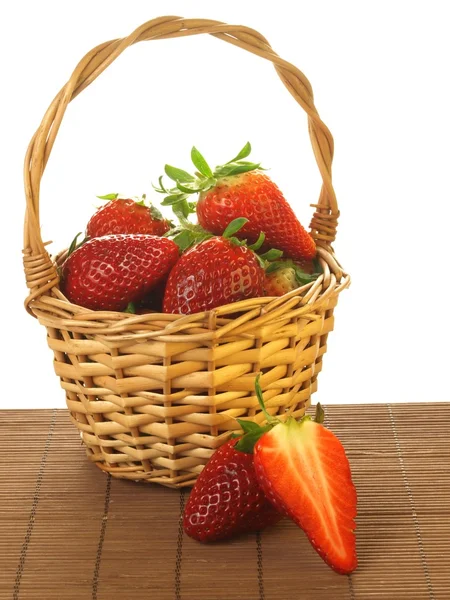 Strawberries in a basket, isolated — Stock Photo, Image