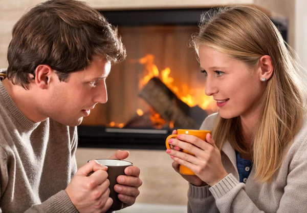 Hot drinks and fireplace — Stock Photo, Image