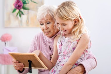 Family looking at pictures clipart