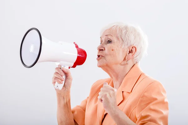 Grandma with megaphone — Stock Photo, Image
