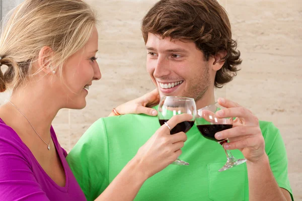 Happy couple with wine glasses — Stock Photo, Image