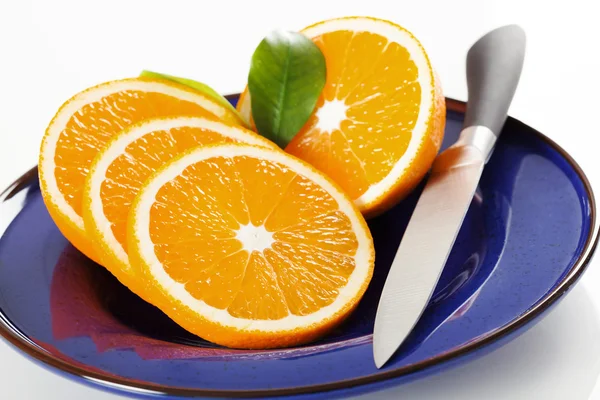Narancs szelet, egy tányérra — Stock Fotó