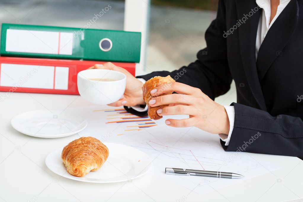 Break for coffee with croissant