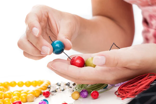 Wooden beads springing — Stock Photo, Image