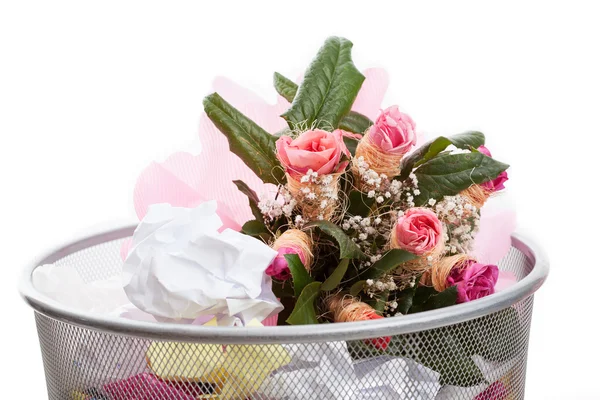 Flowers in dustbin — Stock Photo, Image