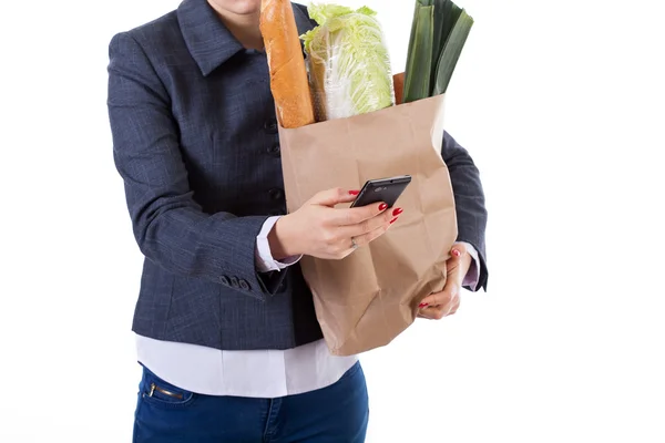 Mujer activa con teléfono y compras —  Fotos de Stock