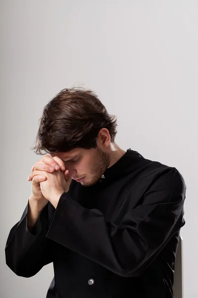 Priest meditating — Stock Photo, Image