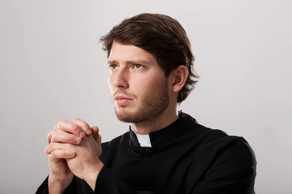 Clergyman praying — Stock Photo, Image