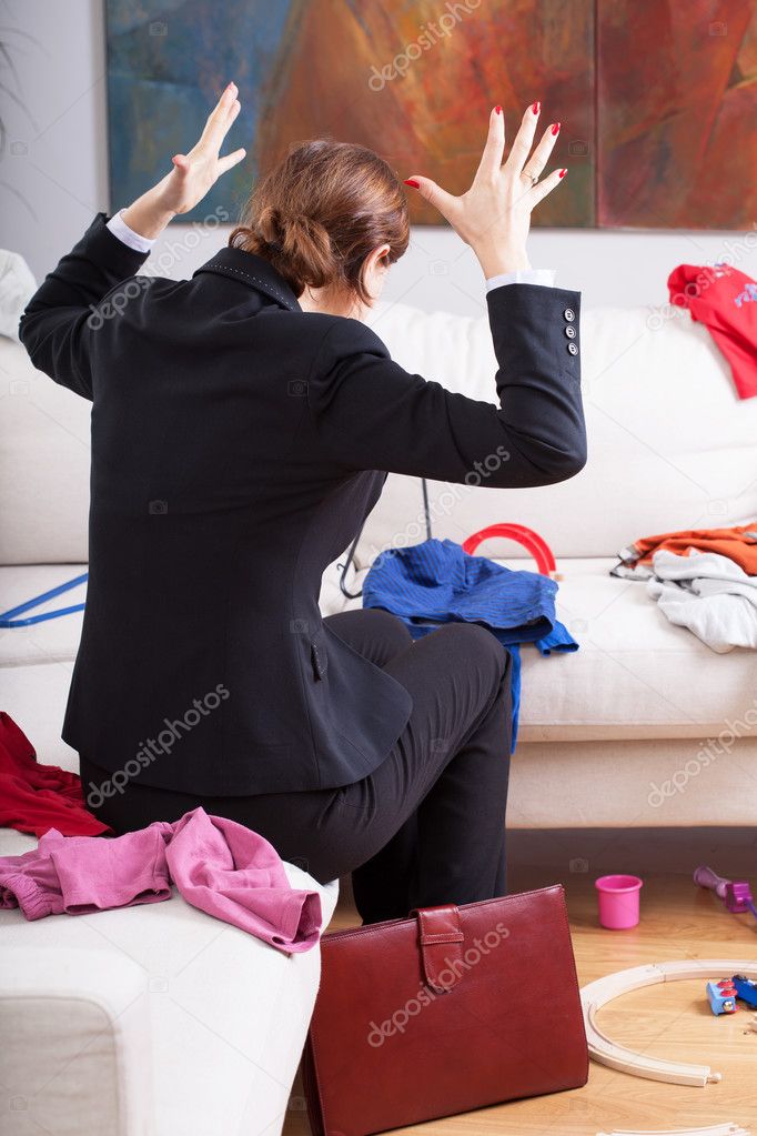 Woman is frustrated of mess at home
