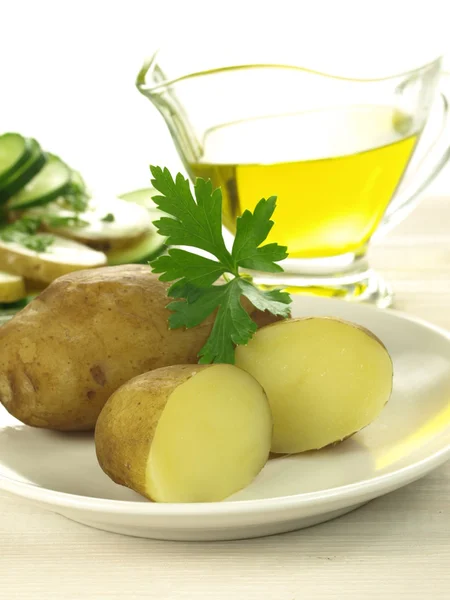 Chaqueta de patatas y aceite —  Fotos de Stock