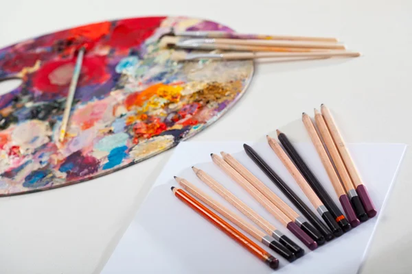 Artistic tools and painting palette — Stock Photo, Image