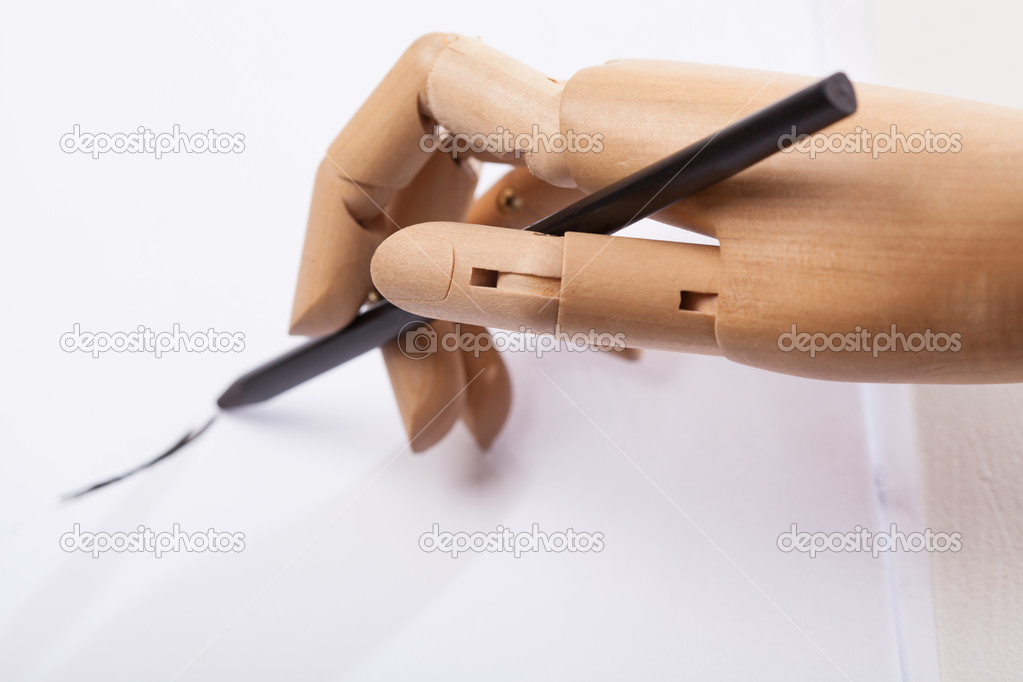Wooden hand drawing Stock Photo by ©photographee.eu 39482795