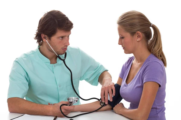 Cardiologist testing blood pressure — Stock Photo, Image