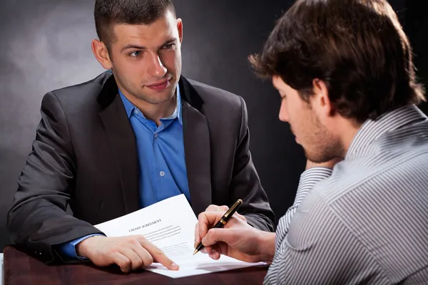 Dishonest businessman — Stock Photo, Image