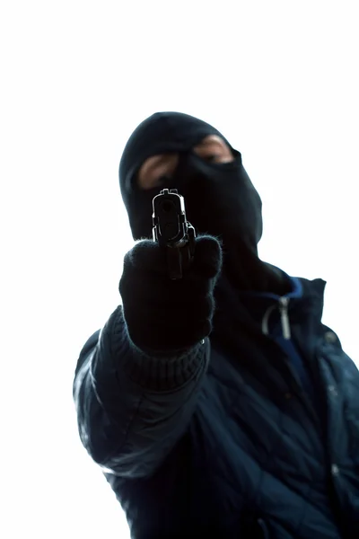 Maskerad man med pistol — Stockfoto